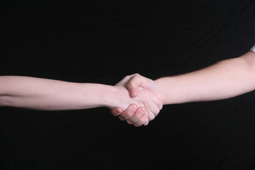 man and woman handshake