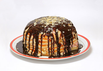 Sponge cake with chocolate, jam and almond
