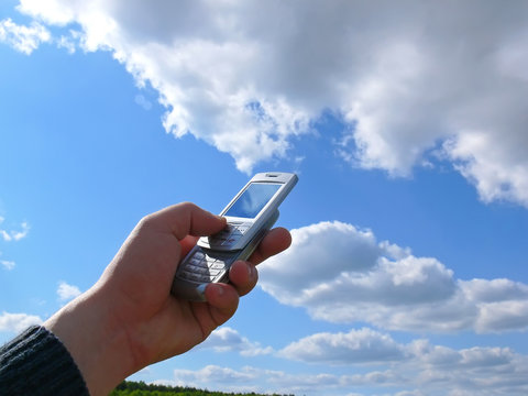  mobile phone in a blue sky