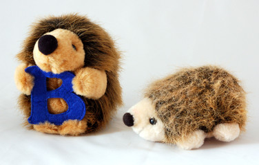 2 toy hedgehogs
