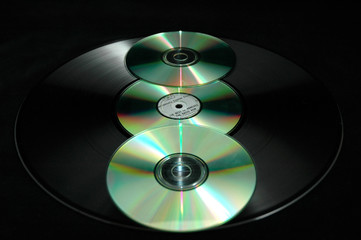 cds and vinyl record