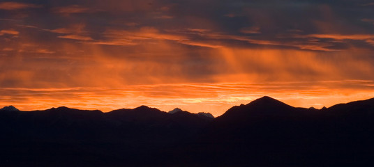 firey skies as the sun arrives over Anchorage Alaska