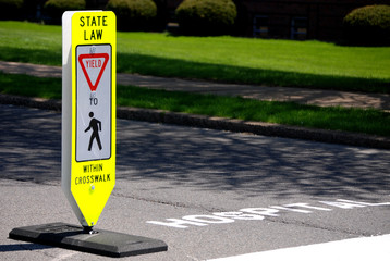 pedestrian yield sign