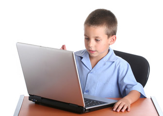 school boy with laptop