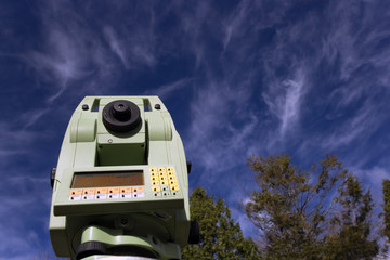 land surveying under blue sky