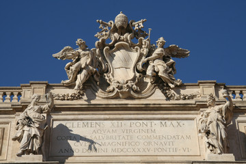 Fototapeta na wymiar Statues at Fontana di Trevi in Rome, Italy