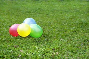 balloons on a grass
