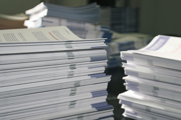 piles of handout papers