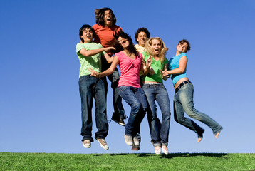 happy smiling group jumping