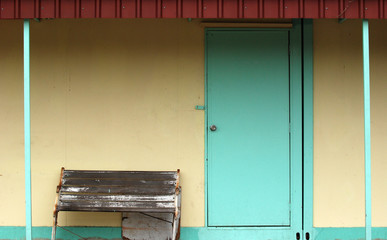 old house and wooden chair