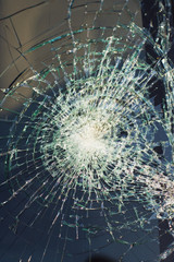 web of splits on the triplex windscreen