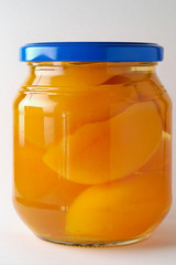 glass jar of prerserved peachers (1)