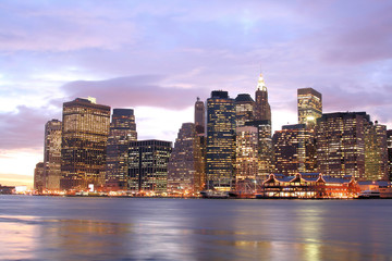 lower manhattan skyline at sunset