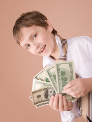 young businessman showing money