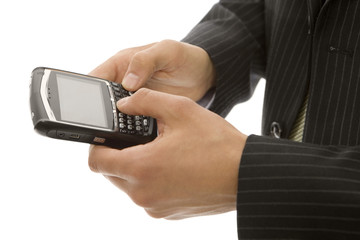 businessman texts on phone