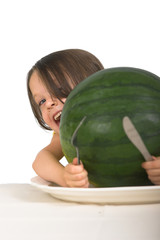 Fototapeta premium little girl with plate of watermelon