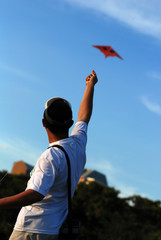 a man flying a kite