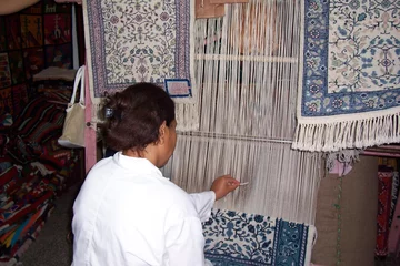 Gordijnen lavorazione tappeti © Alessia75