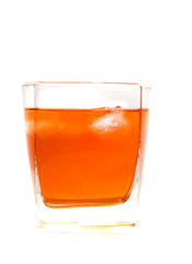 a glass of whiskey with ice