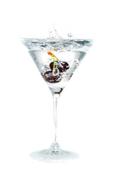cocktail. cherry splashing into martini