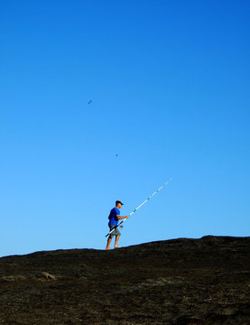 fishing on top of the rock