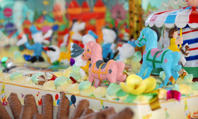 birthday cake with little figures.