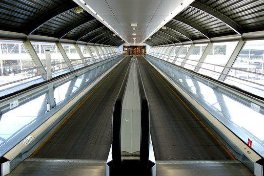 tunnel in airport with mechanical passage