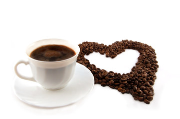 cup of coffee with heart of coffee beans