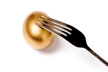 golden egg and fork