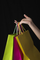 hand and shopping bags