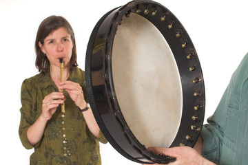 mid-age woman playing flute