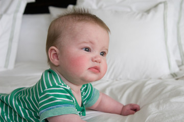 baby boy on bed