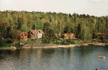 Fototapeta na wymiar Häuser am See | domy nad jeziorem