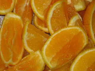 Afwasbaar Fotobehang Plakjes fruit Sinaasappelschijfjes