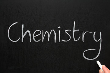 Chemistry, written with white chalk on a blackboard.