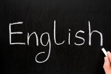 English, written with white chalk on a blackboard.