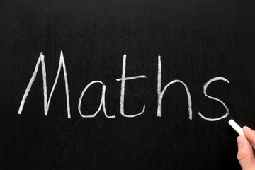 Maths, written with white chalk on a blackboard.