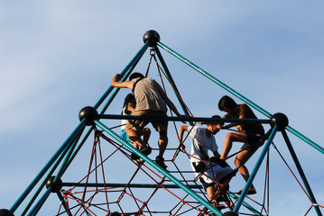 children climbing the pyramid in the parks