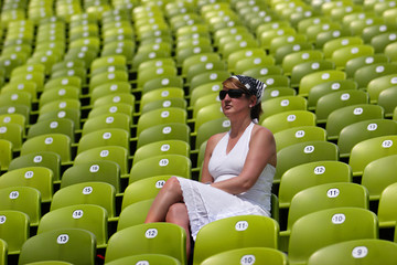 a female spectator in the sun