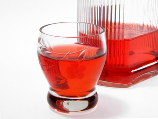 Bottle with alcohol and wine-glasses