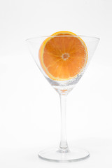 sliced orange in a martini glass