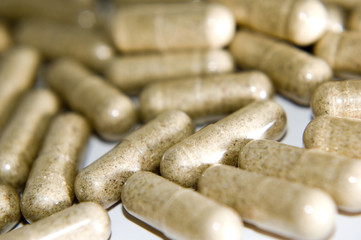 long beige pills