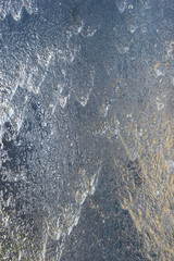 water pouring over glass