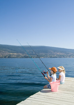 kids fishing in lake