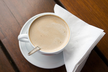 flat white coffee on table - Powered by Adobe