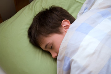 young boy sleeping