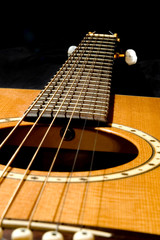 Obraz premium acoustic guitar on black 2