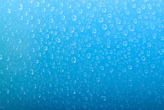 water drops on gradient blue background
