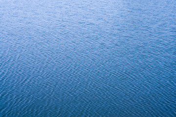 water in a river or a lake.