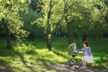 mother with baby carriage